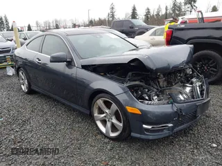 2014 Mercedes-Benz C-Class C 350 with VIN WDDGJ8JB8EG321184, listed as a IAAI auction lot 41069037 with 104,454 mi miles. Bid and sale history available at carsss.com. Image 1.
