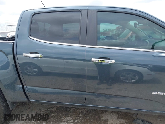 2019 GMC Canyon 4WD Denali with VIN 1GTG6EEN6K1354469, listed as a IAAI auction lot 41902101 with 27,096 mi miles. Bid and sale history available at carsss.com. Image 14.