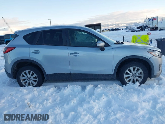 2016 Mazda CX-5 Touring with VIN JM3KE4CY9G0904000, listed as a IAAI auction lot 41186630 with 73,900 mi miles. Bid and sale history available at carsss.com. Image 13.