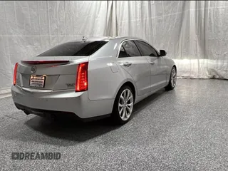 2014 Cadillac ATS z VIN 1G6AD5S36E0100031, wystawiony jako Copart lot #56766655 z przebiegiem 114 822 mil mil oraz Czysty tytuł • Clean title. Historia ofert i sprzedaży dostępna na DreamBid. Obrazek 3.