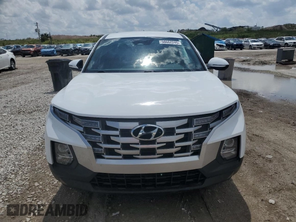 2022 Hyundai Santa Cruz SEL z VIN 5NTJB4AE7NH005711, wystawiony jako Copart lot #50662245 z przebiegiem 32 354 mil mil oraz Nie do naprawy • Non repairable. Historia ofert i sprzedaży dostępna na DreamBid. Obrazek 5.