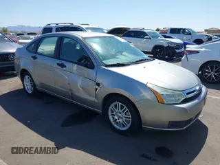 2008 Ford Focus SE with VIN 1FAHP35N68W154490, listed as a IAAI auction lot 42128643 with 141,316 mi miles. Bid and sale history available at carsss.com. Image 1.