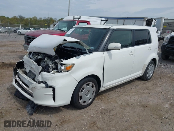 2012 Scion xB with VIN JTLZE4FE4CJ004977, listed as a IAAI auction lot 42116864 with 119,206 mi miles. Bid and sale history available at carsss.com. Image 2.