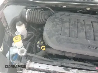 2020 Dodge Grand Caravan SE with VIN 2C4RDGBG2LR221690, listed as a Copart auction lot 80886935 with 60,677 mi miles and Salvage title. Bid and sale history available at DreamBid. Image 15.