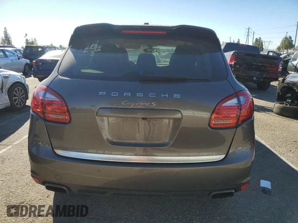 2014 Porsche Cayenne S Hybrid with VIN WP1AE2A2XELA50071, listed as a Copart auction lot 83904494 with 76,436 mi miles and Salvage title. Bid and sale history available at DreamBid. Image 6.