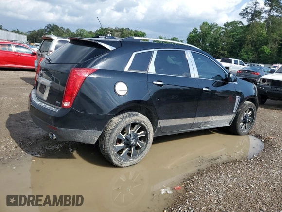 2015 Cadillac SRX Premium Collection with VIN 3GYFNDE32FS572480, listed as a Copart auction lot 54456725 with 82,573 mi miles and Salvage title. Bid and sale history available at DreamBid. Image 3.