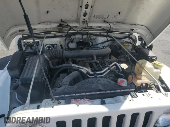 2000 Jeep Wrangler Sahara with VIN 1J4FA59S6YP790541, listed as a Copart auction lot 53837885 with 137,827 mi miles and Salvage title. Bid and sale history available at DreamBid. Image 11.