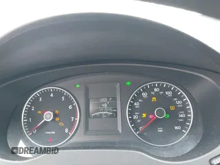 2014 Volkswagen Jetta SE z VIN 3VWD17AJ8EM211169, wystawiony jako IAAI lot #41978416 z przebiegiem 141 545 mil mil oraz . Historia ofert i sprzedaży dostępna na DreamBid. Obrazek 7.