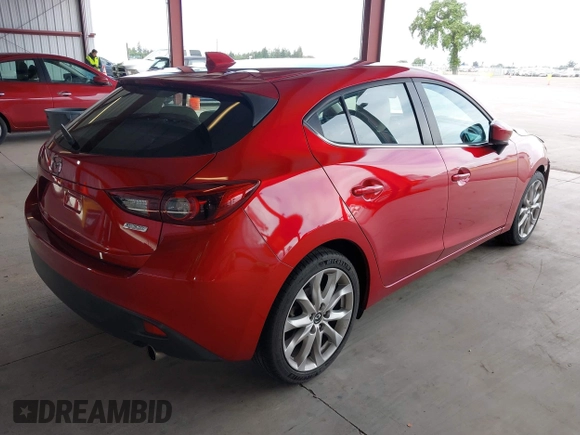 2014 Mazda 3 S Grand Touring with VIN JM1BM1M38E1200696, listed as a IAAI auction lot 41906426 with 50,048 mi miles and . Bid and sale history available at DreamBid. Image 4.
