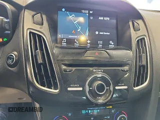 2016 Ford Focus Electric z VIN 1FADP3R47GL320483, wystawiony jako IAAI lot #42392319 z przebiegiem 74 612 mil mil oraz . Historia ofert i sprzedaży dostępna na DreamBid. Obrazek 11.