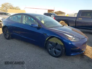 2022 Tesla Model 3 with VIN 5YJ3E1EA3NF190553, listed as a IAAI auction lot 41760731 with 90,268 mi miles. Bid and sale history available at carsss.com. Image 1.