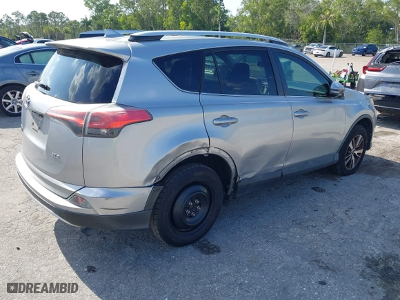 2016 Toyota RAV4 XLE with VIN 2T3WFREV7GW280362, listed as a IAAI auction lot 42023972 with 160,651 mi miles. Bid and sale history available at carsss.com. Image 4.