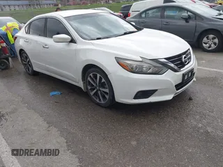 2017 Nissan Altima SR with VIN 1N4AL3AP0HN345977, listed as a IAAI auction lot 41937530 with 121,292 mi miles and . Bid and sale history available at carsss.com. Image 1.
