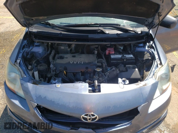 2009 Toyota Yaris z VIN JTDBT903191307764, wystawiony jako Copart lot #53498945 z przebiegiem 212 530 mil mil oraz Szkody całkowita. Historia ofert i sprzedaży dostępna na DreamBid. Obrazek 11.