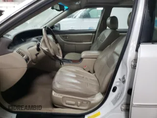 2003 Toyota Avalon XL with VIN 4T1BF28B73U330445, listed as a Copart auction lot 49662095 with 106,597 mi miles and Salvage Title. Bid and sale history available at carsss.com. Image 7.
