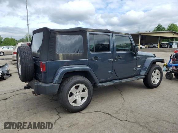 2008 Jeep Wrangler Unlimited Sahara with VIN 1J4GA59108L562831, listed as a Copart auction lot 58949225 with 206,312 mi miles and Clean title. Bid and sale history available at DreamBid. Image 3.