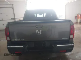 2020 Honda Ridgeline RTL-E with VIN 5FPYK3F75LB001516, listed as a IAAI auction lot 41605859 with 93,902 mi miles and . Bid and sale history available at DreamBid. Image 16.