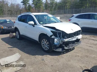 2016 Mazda CX-5 Touring with VIN JM3KE4CY5G0819056, listed as a IAAI auction lot 42085033 with 106,607 mi miles and . Bid and sale history available at carsss.com. Image 1.