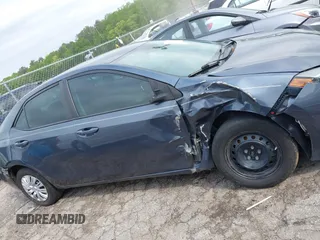 2019 Toyota Corolla L with VIN 5YFBURHE8KP936426, listed as a IAAI auction lot 42029018 with 190,163 mi miles and . Bid and sale history available at DreamBid. Image 13.