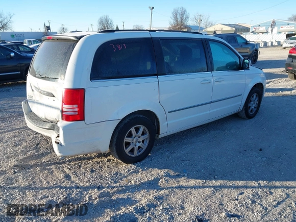2010 Chrysler Town & Country Touring with VIN 2A4RR5D18AR310587, listed as a IAAI auction lot 41223813 with 144,626 mi miles. Bid and sale history available at carsss.com. Image 4.