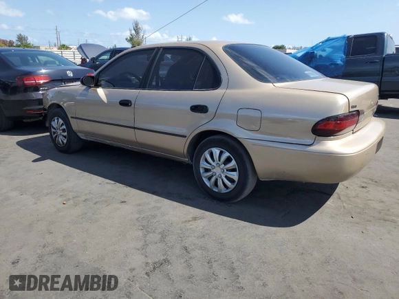1997 Geo Prizm LSi z VIN 1Y1SK5263VZ408119, wystawiony jako Copart lot #52308235 z przebiegiem 344 971 mil mil oraz Szkody całkowita. Historia ofert i sprzedaży dostępna na DreamBid. Obrazek 2.
