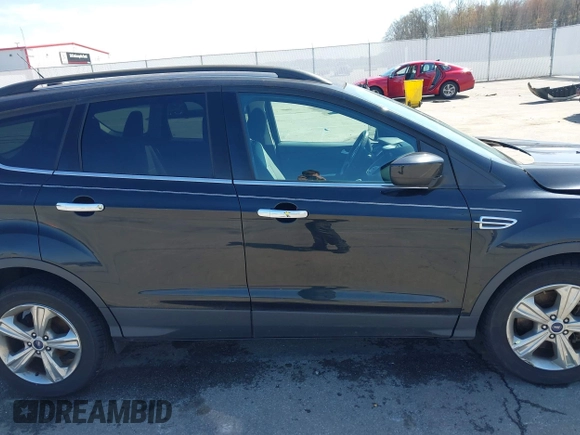 2015 Ford Escape SE with VIN 1FMCU9G9XFUC14744, listed as a IAAI auction lot 41967223 with 161,513 mi miles. Bid and sale history available at carsss.com. Image 14.