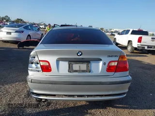 1999 BMW 3 Series 323i with VIN WBAAM3335XFP60154, listed as a IAAI auction lot 41593866 with 189,367 mi miles. Bid and sale history available at carsss.com. Image 17.