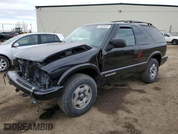 2005 Chevrolet Blazer LS z VIN 1GNCT18X65K103468, wystawiony jako Copart lot #51663025 z przebiegiem 180 451 mil mil oraz Szkoda całkowita • Salvage title. Historia ofert i sprzedaży dostępna na DreamBid. Obrazek 1.