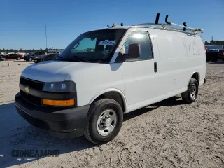 2018 Chevrolet Express Cargo Van with VIN 1GCWGAFP7J1308813, listed as a Copart auction lot 76701314 with 230,531 mi miles and Clean Title. Bid and sale history available at carsss.com. Image 1.