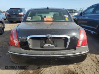 2009 Kia Amanti z VIN KNALD225095171348, wystawiony jako Copart lot #76008324 z przebiegiem Nie podano mil oraz Szkody całkowita. Historia ofert i sprzedaży dostępna na DreamBid. Obrazek 6.