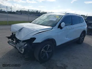 2019 Volkswagen Tiguan SE with VIN 3VV3B7AX9KM067418, listed as a IAAI auction lot 41434045 with 96,968 mi miles. Bid and sale history available at carsss.com. Image 2.