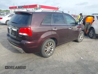 2011 Kia Sorento SX with VIN 5XYKW4A28BG127753, listed as a IAAI auction lot 42033754 with 163,470 mi miles. Bid and sale history available at carsss.com. Image 4.