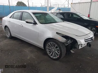 2018 Cadillac CTS Sedan Luxury AWD with VIN 1G6AX5SX2J0127618, listed as a IAAI auction lot 41785890 with 79,994 mi miles. Bid and sale history available at carsss.com. Image 1.