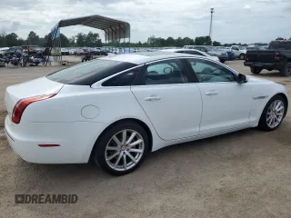 2015 Jaguar XJ with VIN SAJWA1CZ9F8V82974, listed as a Copart auction lot 59364344 with 64,012 mi miles and Salvage Title. Bid and sale history available at carsss.com. Image 3.