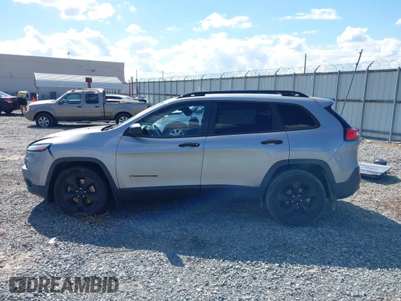2016 Jeep Cherokee Sport with VIN 1C4PJLAB0GW369428, listed as a IAAI auction lot 42264097 with 130,952 mi miles and . Bid and sale history available at DreamBid. Image 14.