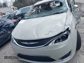 2017 Chrysler Pacifica Limited with VIN 2C4RC1GG9HR560544, listed as a IAAI auction lot 41807810 with 137,768 mi miles and . Bid and sale history available at DreamBid. Image 12.