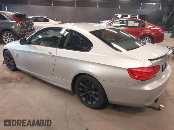 2011 BMW 3 Series 335i xDrive with VIN WBAKF9C56BE261882, listed as a IAAI auction lot 42393269 with 131,000 mi miles and . Bid and sale history available at DreamBid. Image 3.