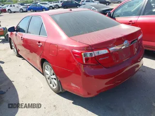 2014 Toyota Camry SE with VIN 4T1BK1FK8EU547143, listed as a IAAI auction lot 41876192 with 209,535 mi miles. Bid and sale history available at carsss.com. Image 3.
