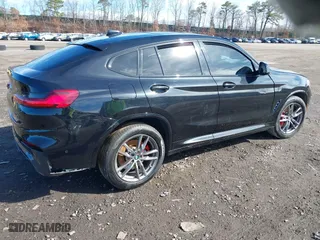 2021 BMW X4 M40i with VIN 5UX2V5C03M9H54824, listed as a IAAI auction lot 41817714 with 34,880 mi miles. Bid and sale history available at carsss.com. Image 4.