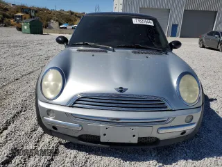 2002 MINI Hardtop with VIN WMWRC33472TC34281, listed as a Copart auction lot 71631644 with 196,947 mi miles and Salvage Title. Bid and sale history available at DreamBid. Image 5.