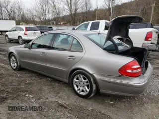 2003 Mercedes-Benz E-Class 3.2L with VIN WDBUF65J23A297936, listed as a Copart auction lot 80877004 with 214,478 mi miles and Salvage Title. Bid and sale history available at carsss.com. Image 2.