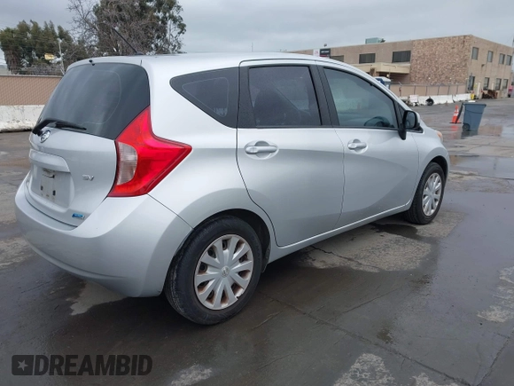 2014 Nissan Note SV with VIN 3N1CE2CP9EL409694, listed as a IAAI auction lot 41807269 with 141,063 mi miles and . Bid and sale history available at DreamBid. Image 4.