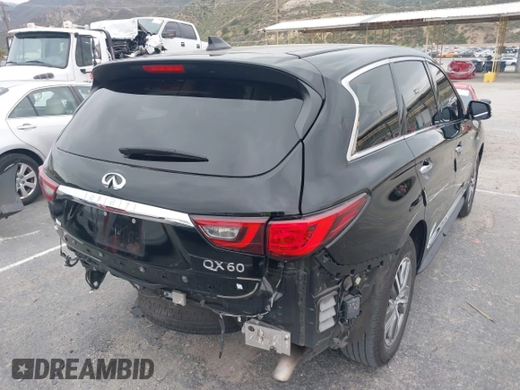 2020 Infiniti QX60 Luxe with VIN 5N1DL0MN2LC540608, listed as a IAAI auction lot 42187929 with 82,227 mi miles and . Bid and sale history available at DreamBid. Image 4.