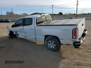 2017 GMC Canyon 4WD SLE z VIN 1GTG6CENXH1143837, wystawiony jako Copart lot #49699225 z przebiegiem 78 865 mil mil oraz Szkody całkowita. Historia ofert i sprzedaży dostępna na DreamBid. Obrazek 2.