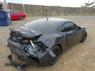 2014 Scion FR-S with VIN JF1ZNAA12E8702261, listed as a IAAI auction lot 41971045 with 124,341 mi miles and . Bid and sale history available at DreamBid. Image 4.