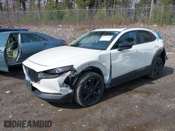 2022 Mazda CX-30 2.5 Turbo with VIN 3MVDMBAY7NM443187, listed as a IAAI auction lot 41771395 with 39,475 mi miles and . Bid and sale history available at DreamBid. Image 17.
