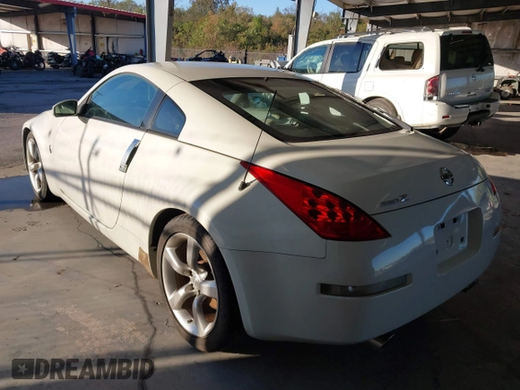 2006 Nissan 350Z Touring z VIN JN1AZ34D86M307042, wystawiony jako IAAI lot #41016528 z przebiegiem 124 303 mil mil oraz . Historia ofert i sprzedaży dostępna na DreamBid. Obrazek 3.