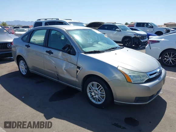 2008 Ford Focus SE with VIN 1FAHP35N68W154490, listed as a IAAI auction lot 42128643 with 141,316 mi miles. Bid and sale history available at carsss.com. Image 1.
