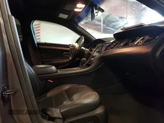 2013 Ford Taurus SEL z VIN 1FAHP2H83DG223446, wystawiony jako Copart lot #53783815 z przebiegiem 122 867 mil mil oraz Czysty tytuł • Clean title. Historia ofert i sprzedaży dostępna na DreamBid. Obrazek 10.