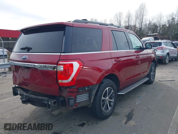 2018 Ford Expedition XLT with VIN 1FMJU1HT6JEA71703, listed as a IAAI auction lot 41606903 with 87,151 mi miles. Bid and sale history available at carsss.com. Image 4.